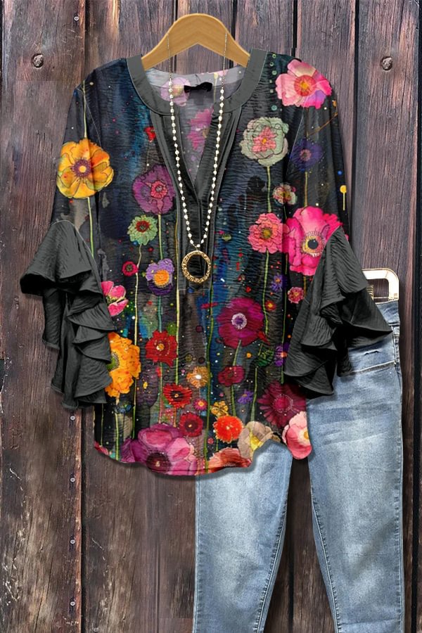 Zwarte blouse met 3D-bloemenprint