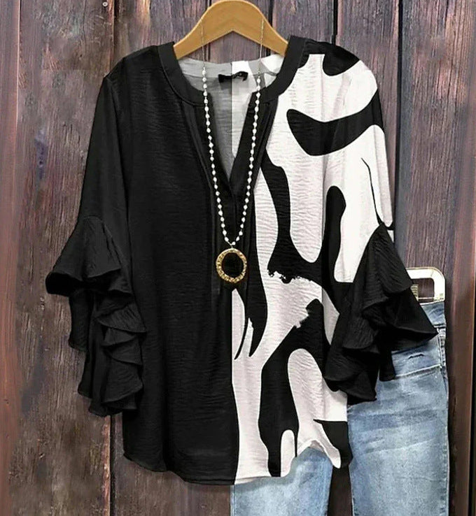 Zwart-witte blouse met 3D-bloemenprint