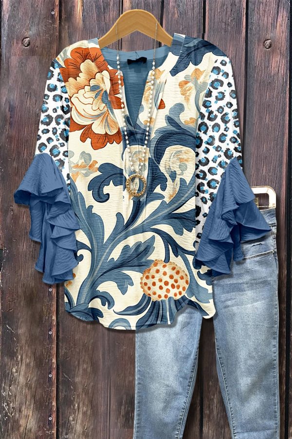 Blauwe blouse met 3D-bloemenprint