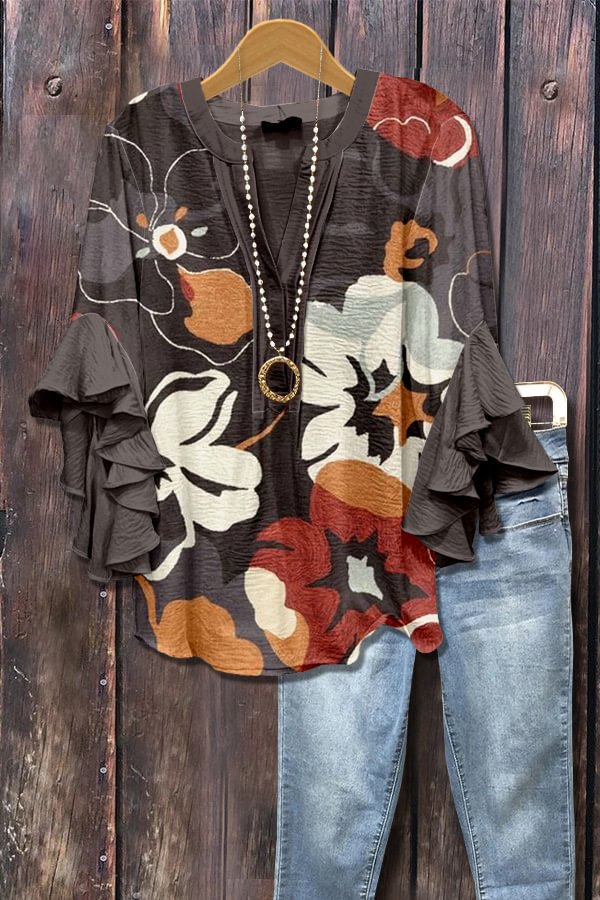 Donkerbruine blouse met 3D-bloemenprint