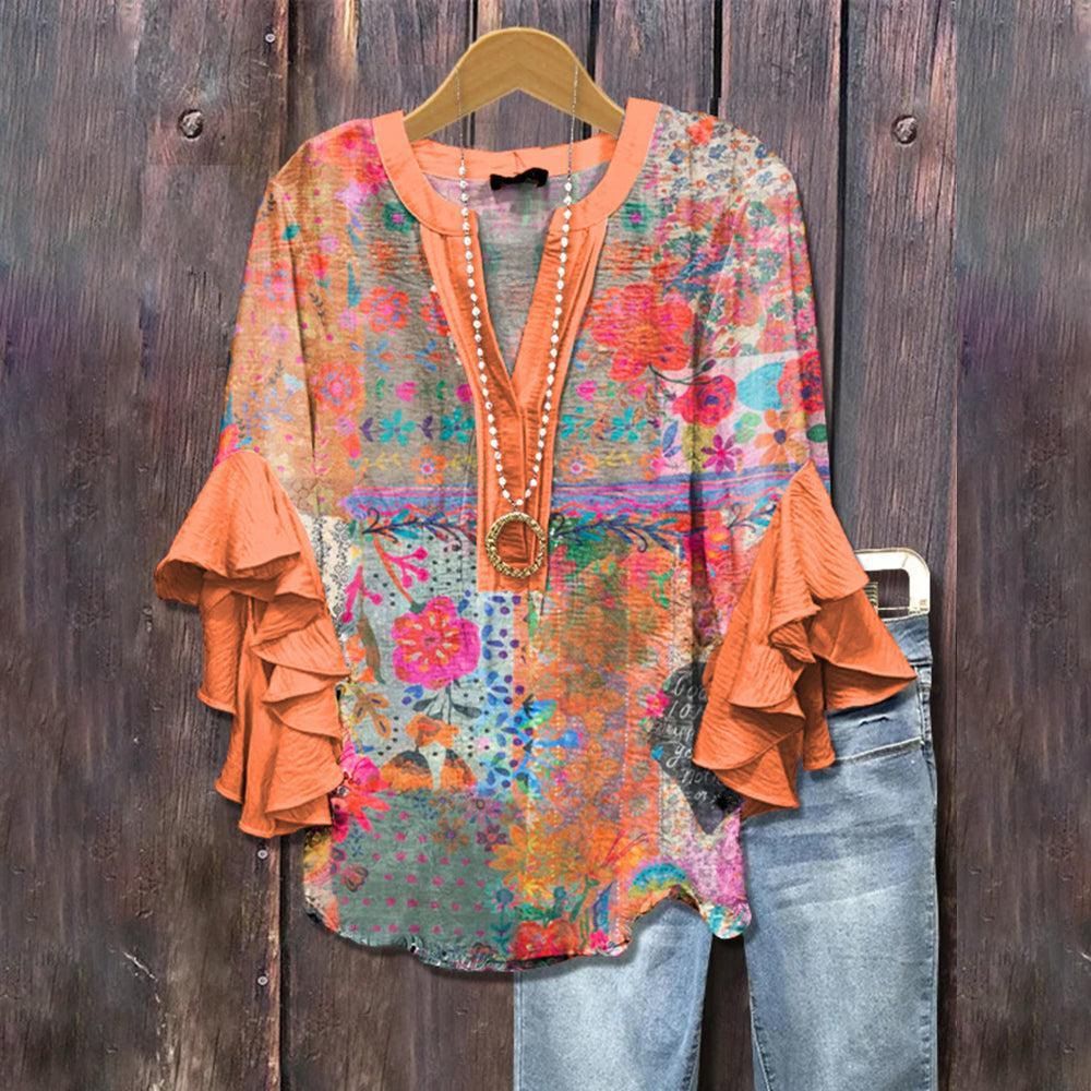 Donkeroranje blouse met 3D-bloemenprint