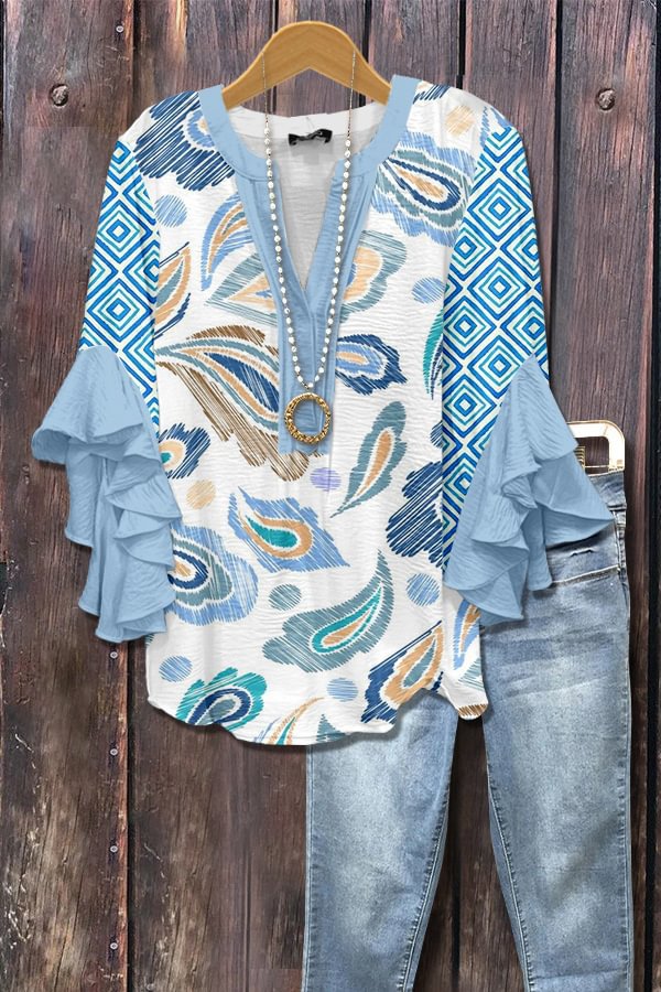 Hemelsblauwe blouse met 3D-bloemenprint
