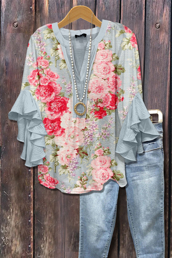 Rozeblauwe blouse met 3D-bloemenprint