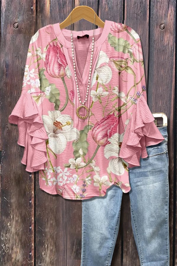 Blauwe blouse met stippen en 3D-bloemenprint