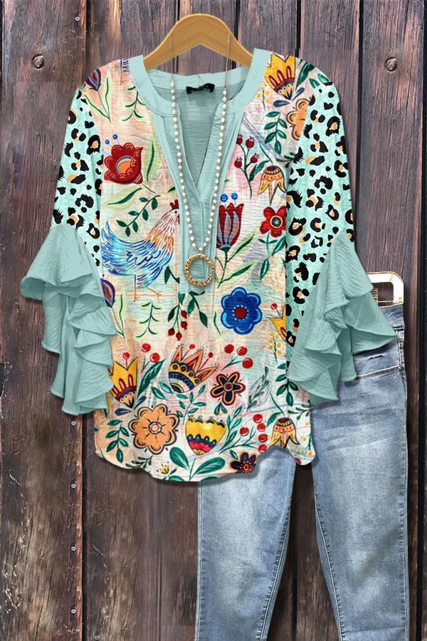 Lichtblauwe blouse met stippen en 3D-bloemenprint
