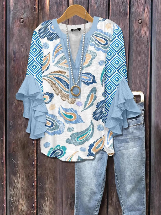 Blauwe en witte blouse met 3D-bloemenprint